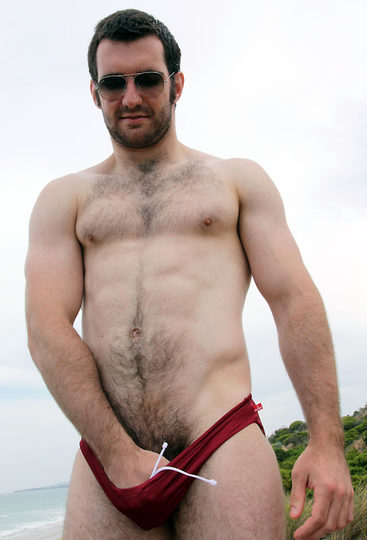 Josh plays with his bulge in a speedo