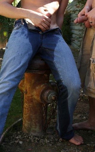 Piss soaked jeans of young guy 