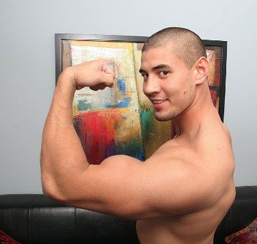 Sexy Asian jock flexes his biceps