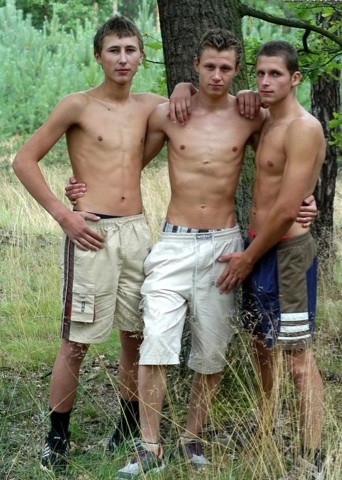 Shirtless young men in the woods