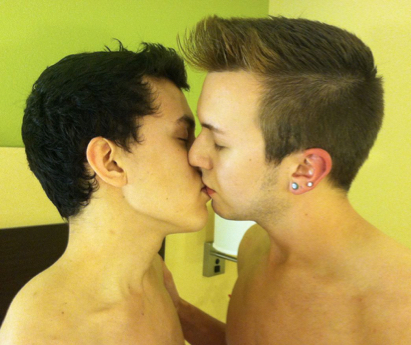 Beautiful boys kissing tenderly