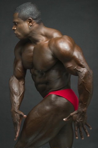 Ripped, competition ready black bodybuilder Sean Jones