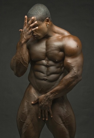 Perfect bodybuilder body - naked with his hand in front of his dick