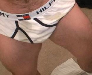 Guy wets his Tommy Hilfiger underwear