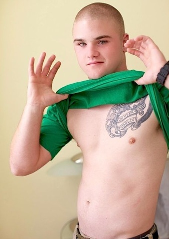 Hot young smooth guy takes his shirt off