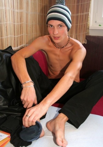 Skinny young twink undressing