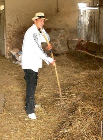 Red Felix working in the barn