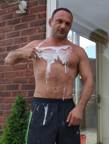 Rod Piston soaps up his chest