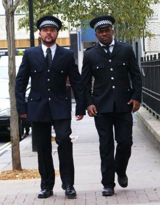 Marcus Troy and Sean Silver in UK police uniforms
