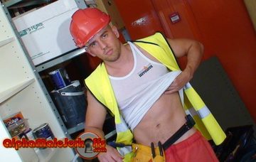 Sexy workman showing his belly