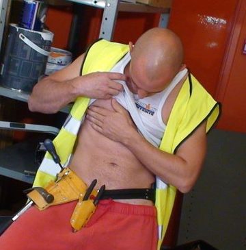Workman feels up his own chest