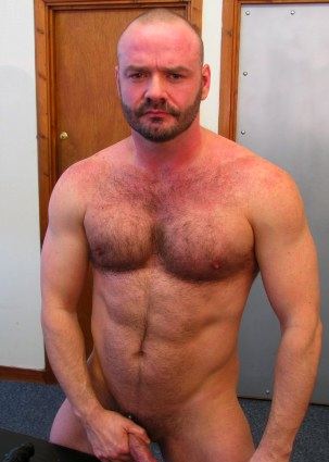 Bearded guy Uncle Johnny grabs his dick and shows off his hairy pecs