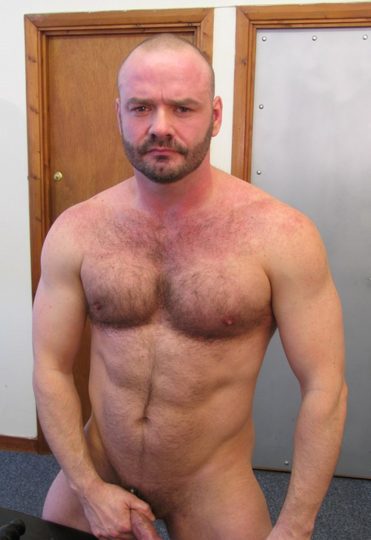 Bearded guy Uncle Johnny grabs his dick and shows off his hairy pecs