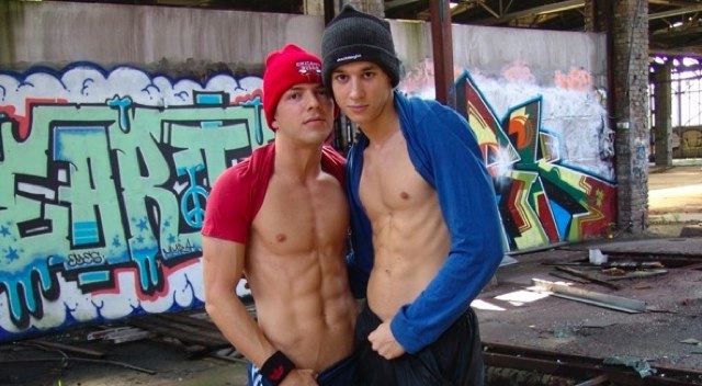 Two young graffiti artists show their washboard abs