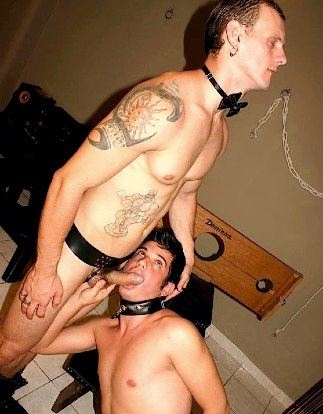 Tattooed top gets his hard uncut dick sucked by his slave
