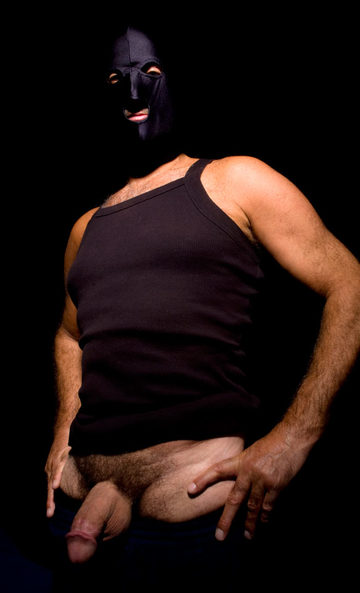 Thick cocked man wearing a mask