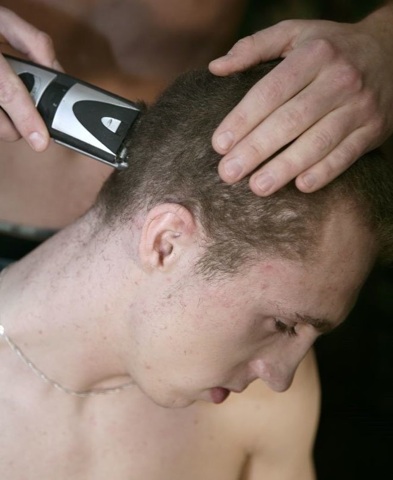 Lerry Ginter gets a military haircut