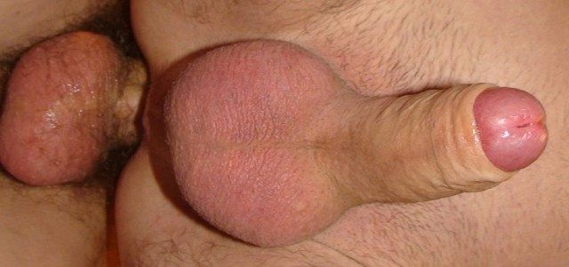 Close-up of raw cock in uncut bottom's hole.