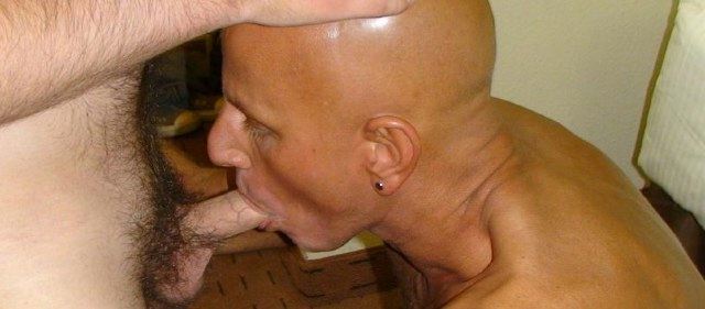 Smooth bald guy sucking dick