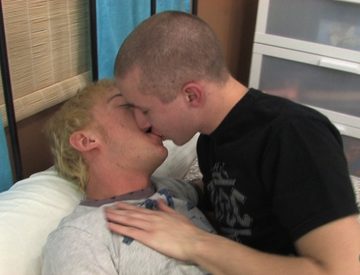 Cute young boys kissing