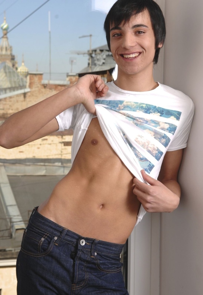 Alex shows off his smooth abs