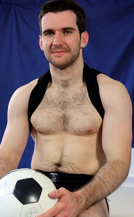 Dark haired soccer jock with furry chest