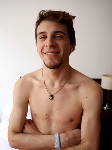 Young shirtless guy with cute smile