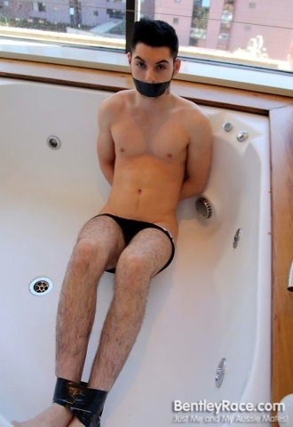 Hot young Clint Harrlord bound and gagged in the tub