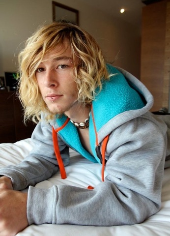 Cute young blond surfer Eligh Rainer