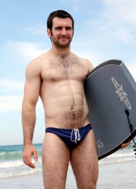Hot young jock Josh in a speedo at the beach
