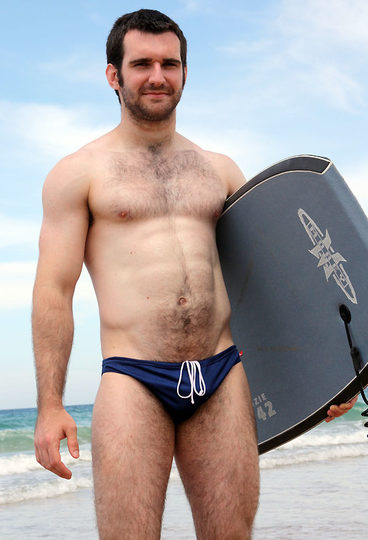 Hot young jock Josh in a speedo at the beach