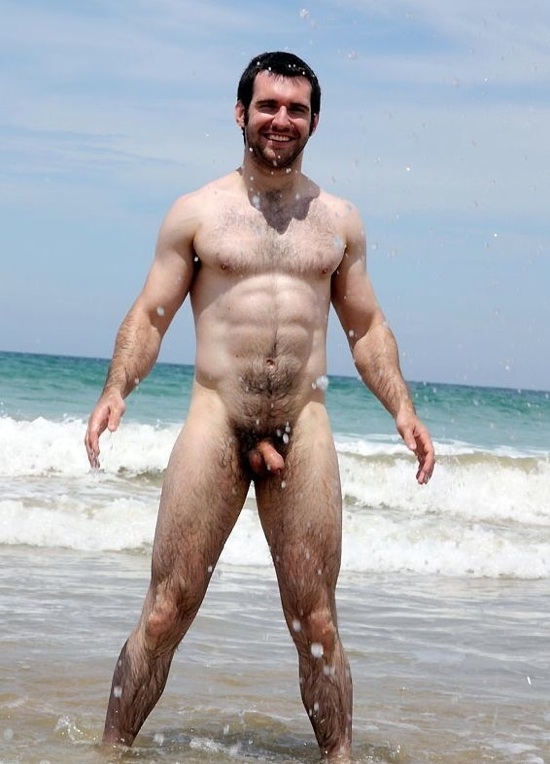 Ripped young muscle cub naked at the beach.