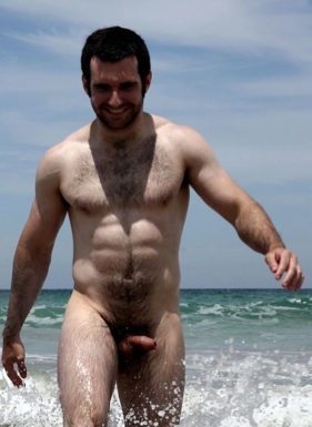 Hot young furry cub with an uncut cock at the beach