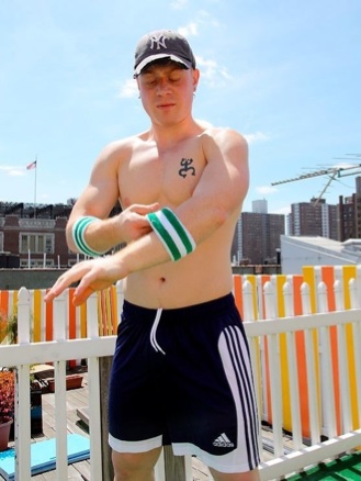 Hot young shirtless jock on a roof top