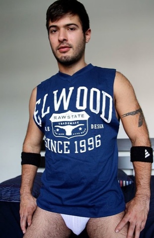 Alexander in a jock and t shirt