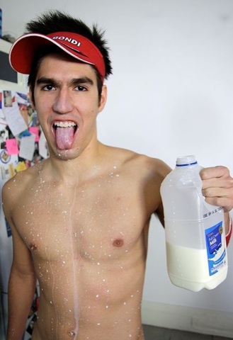 Cute young twink jock Robbie Price covered in milk