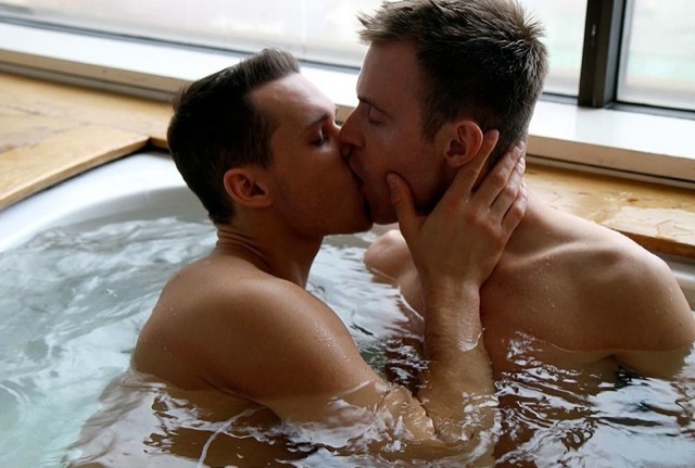 Tate and Jake make out in the hot tub