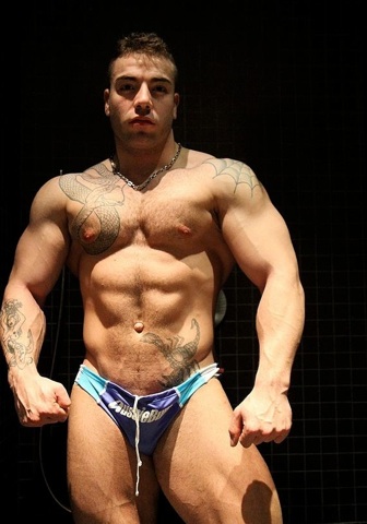 Inked furry muscle stud Mas Hilton in Aussi Bums