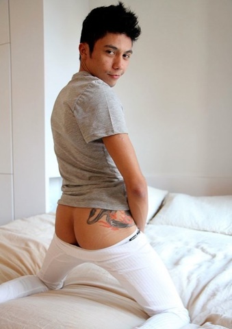 Brent Lopes shows off his smooth tatted ass