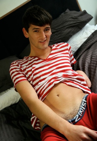 Cute young Chris shows off his smooth tight abs