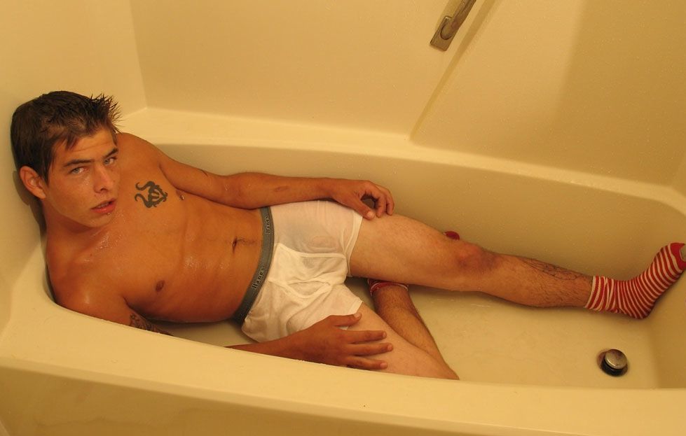Twink in socks and underwear covered in piss