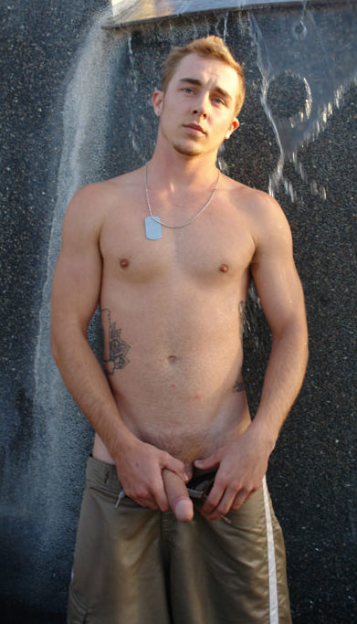 Shirtless thug Kelly Cooper plays with his uncut meat