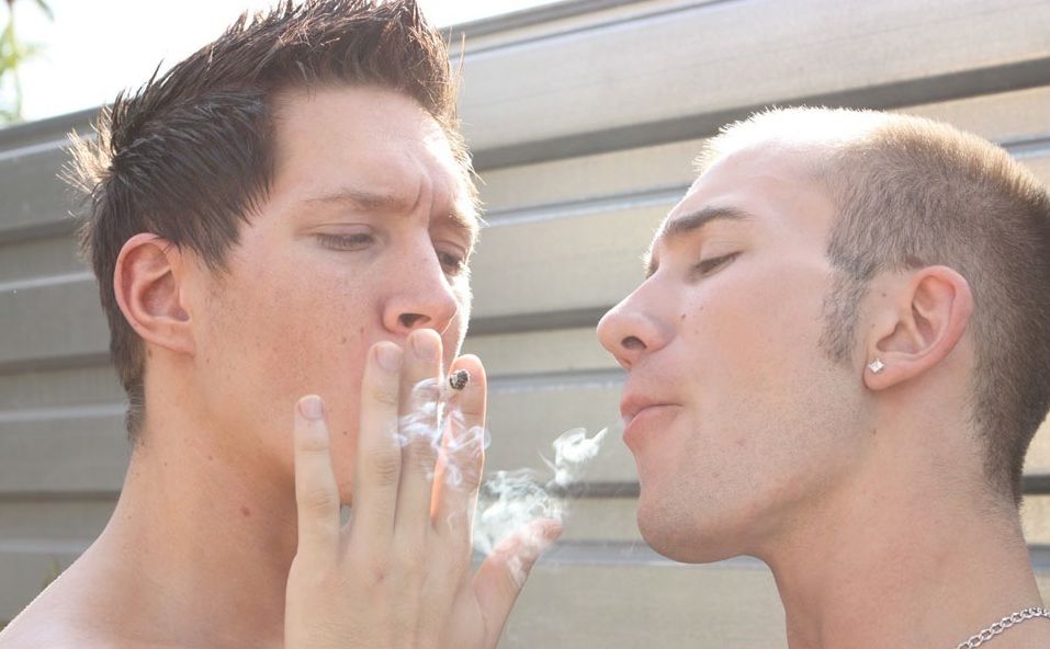 Teenboys share a cigarette