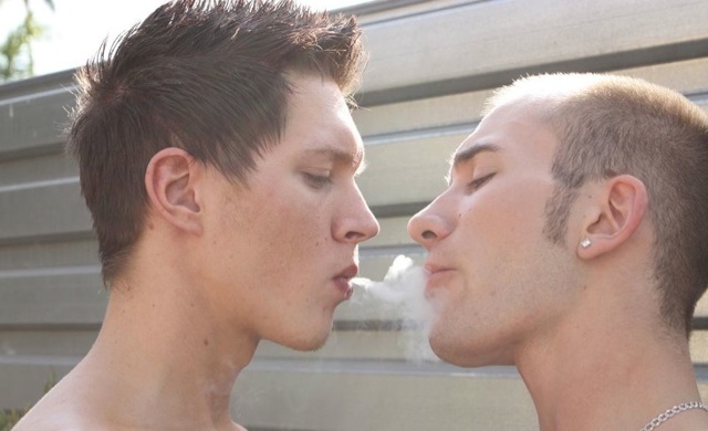 Smooth twink blows smoke in young guys face