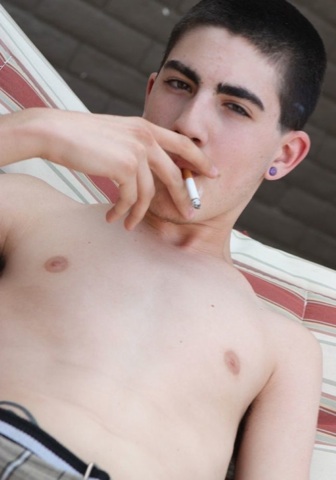 Shirtless twink smoking cigarette
