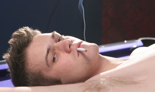 Hot young twink smoking a cigarette shows off his pit