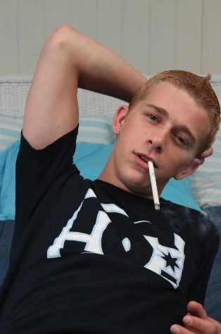 Young Kayden Daniels smoking a cigarette