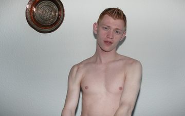 Shirtless red-headed cutie