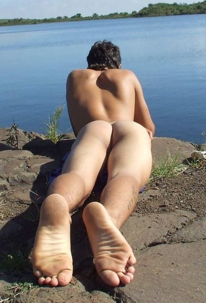 Primo teen ass outdoors by a lake