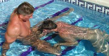 Guy getting a blowjob in a pool
